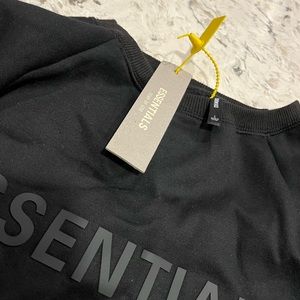 ESSENTIALS sweatshirt. Brand new with tags.